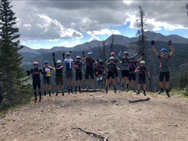 Front Rangers Biking Team Jumping in the air